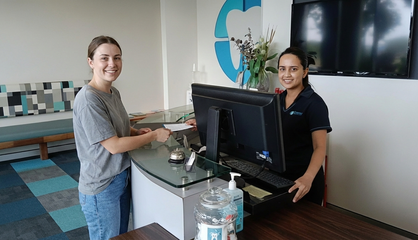 Happy patient smiling at Compass Dental